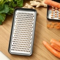 Rig-tig grate it grater with container